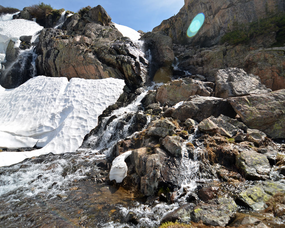 Timberline Falls surrounded by snow and ice.