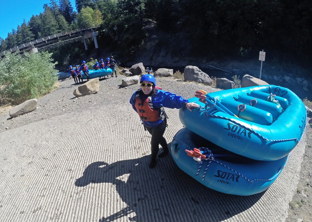 Brooke posing with the rafts after our trip down the white salmon river and over Husam Falls