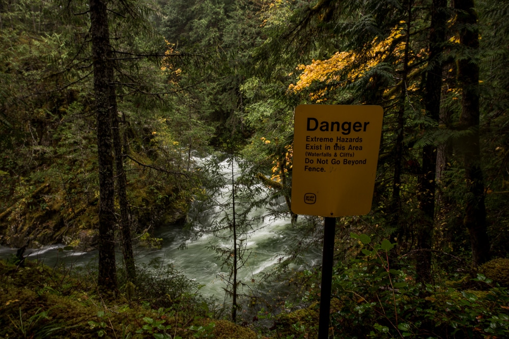 Danger sign warning of extreme hazards next to Little Qualicum Falls