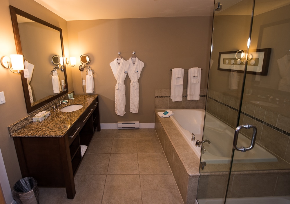 Large bathroom, with soaking tub, walk-in shower and complimentary robes to use