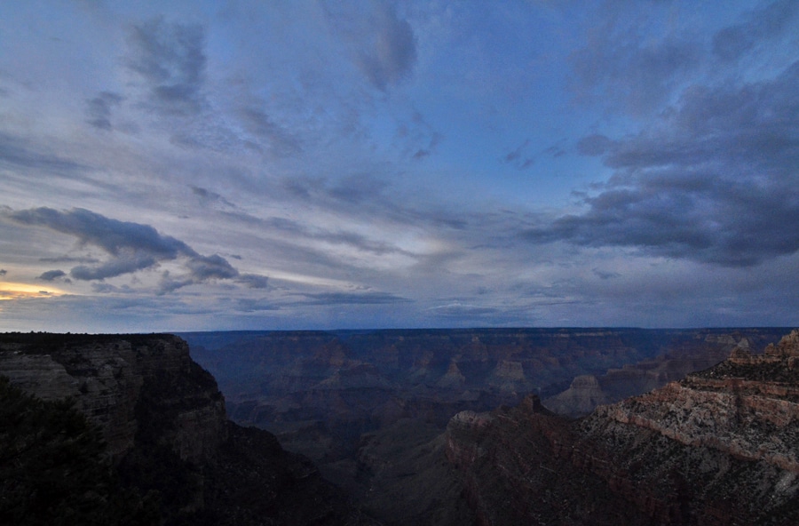 Sunset at the grand canyon with whispy clouds