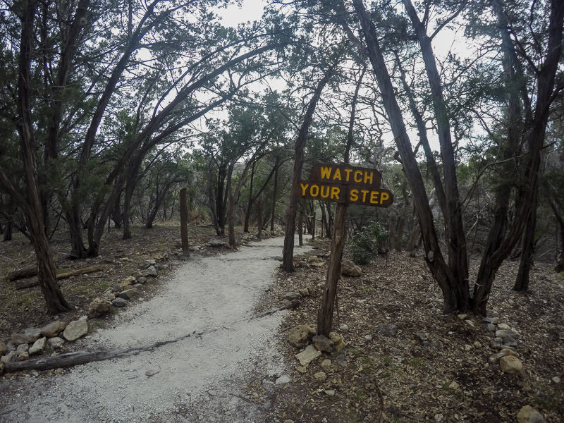 Trail to Jacob's Well letting you know to watch your step