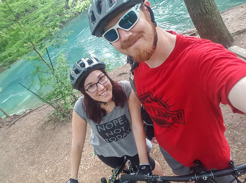 riding bicycles by a river in texas
