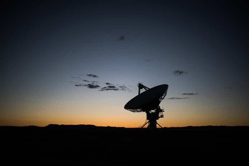 Satellite at sunset at the very large array, new mexico