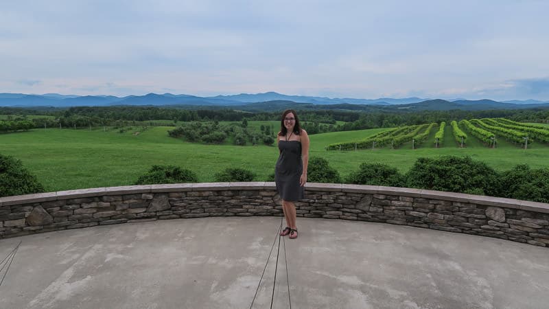 Brooke in front of the vineyard at this South Carolina winery