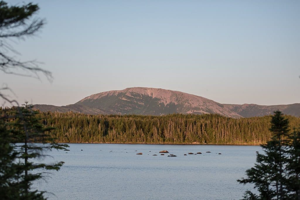 View of Gros Morne Mountain in Newfoundland from a lake in the distance