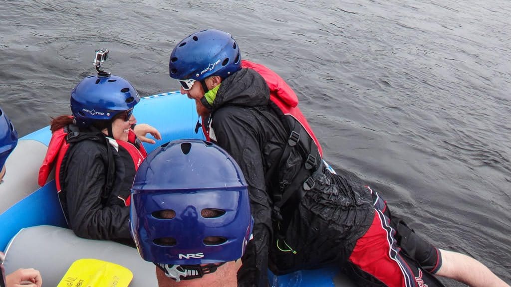 Brooke pulling Buddy back into the raft after he 'fell' into the Exploits River