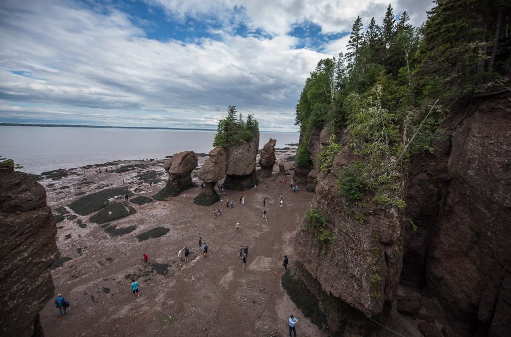 Walking on the Ocean Floor at Hopewell Rocks in New Brunswick ...