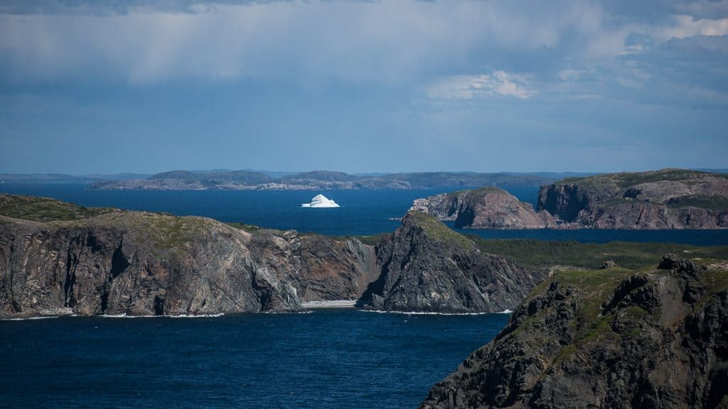 Iceberg off in the distance from a viewing point in Twillingate