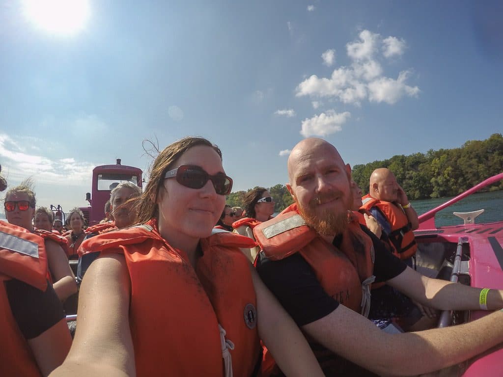 Brooke and Buddy (without his glasses) posing for a photo on the Whirlpool Jet Boat after the tour