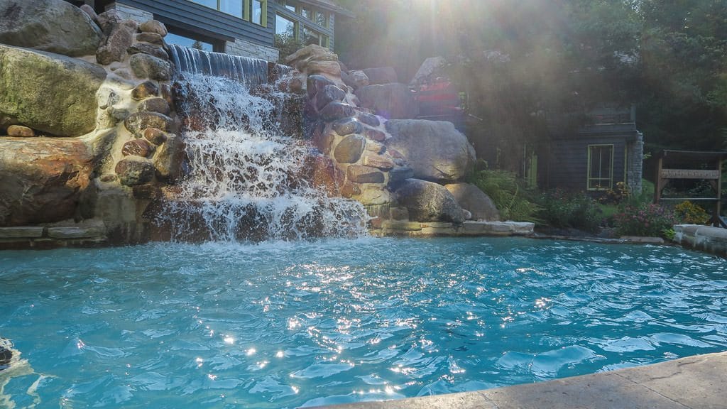 One of the warm pools with a nice waterfall feature to aid in the relaxing atmosphere at scandinave spa in mont-tremblant