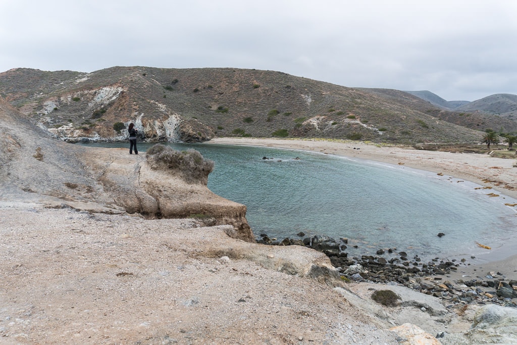 Brooke looking out over Whale Tale rock in Little Harbor on in interior of Catalina Island