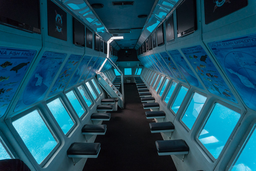 The Undersea Expedition with no passengers showing all the open windows and seating available for the guests.