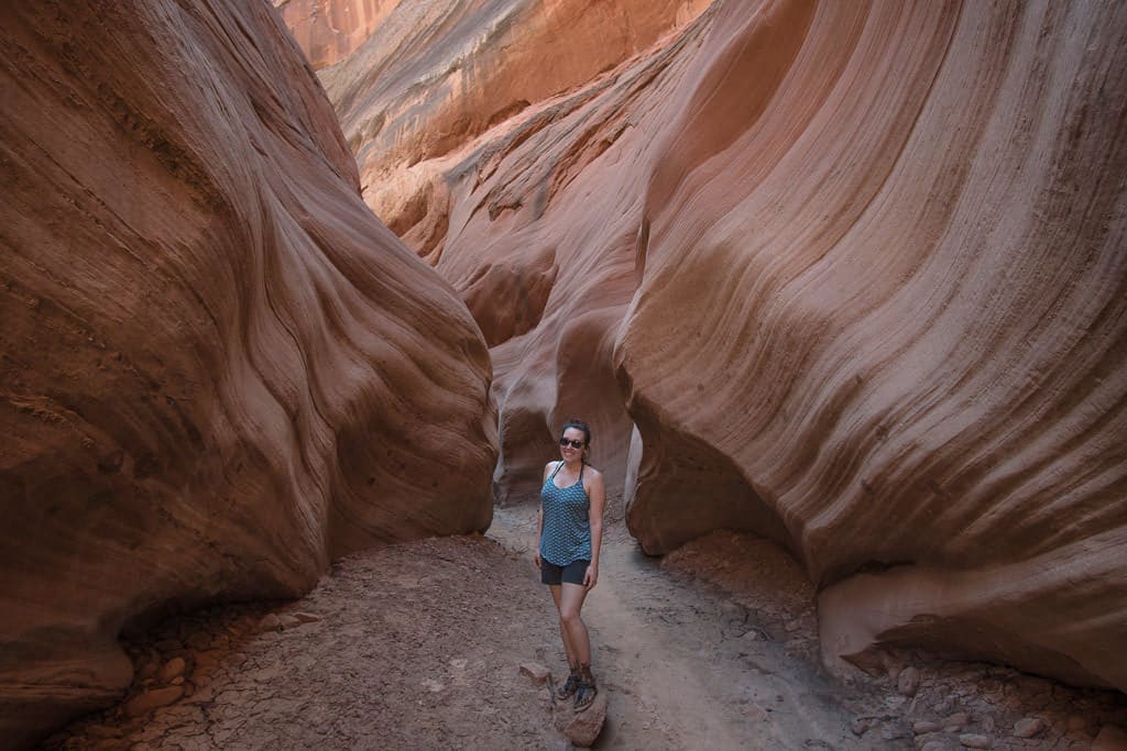 Brooke standing in a slot canyon after our Paddleboard trip on Lake Powell