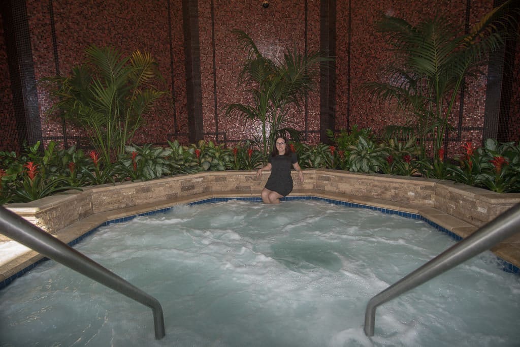 Brooke with her feet in the large indoor hot tub on the roof of Ameristar Black Hawk Resort