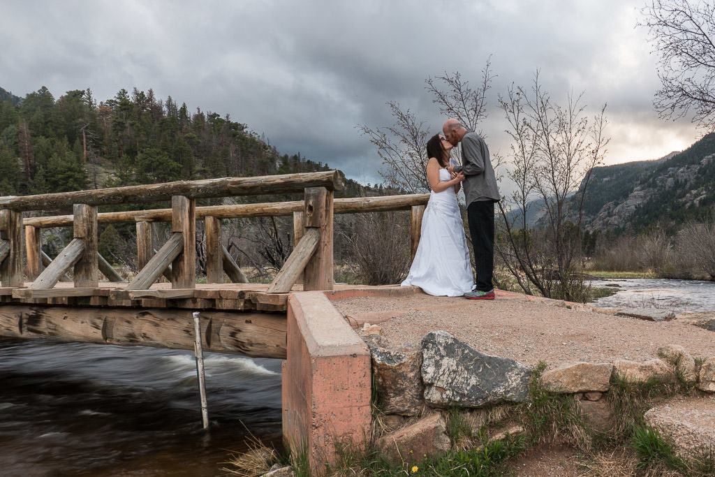 kissing during rocky mountain vow renewal