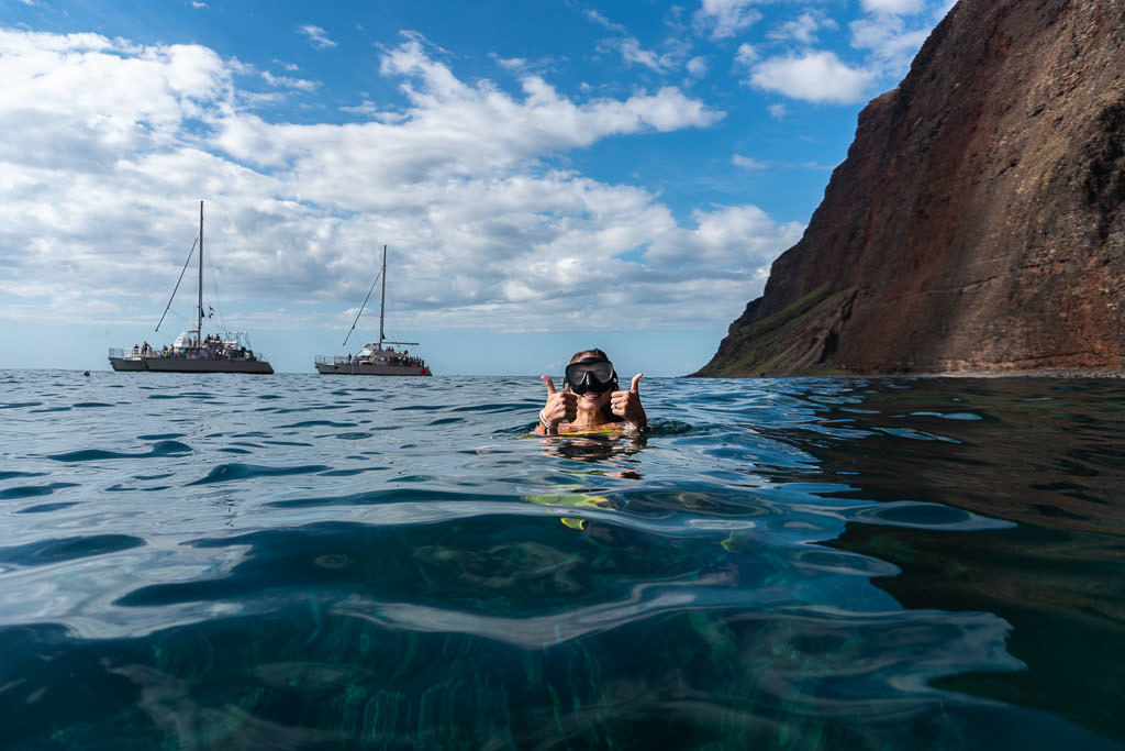 thumbs up snorkeling by na pali coast