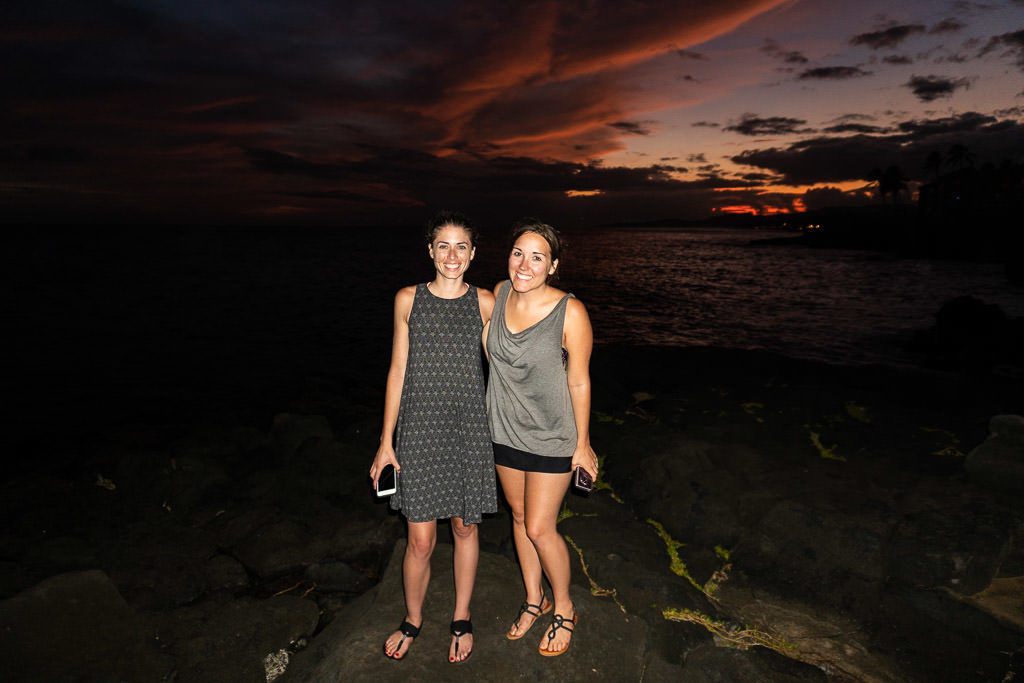 friends watching the sunset on a kauai vacation