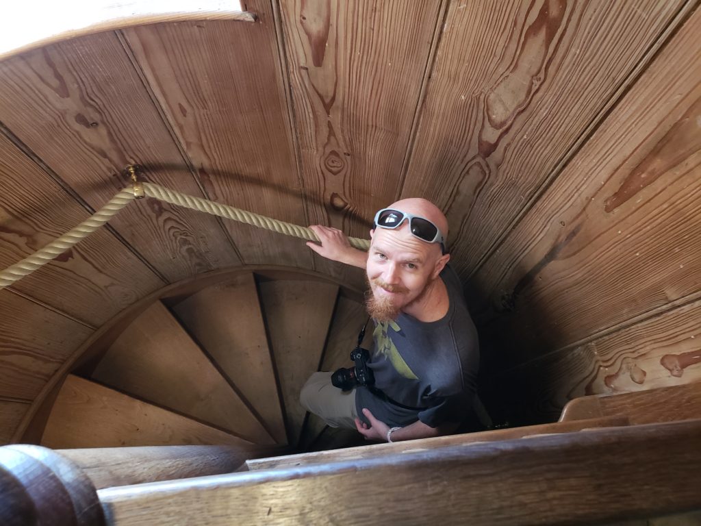 Buddy walking up the spiral stairs during our Dunrobin Castle Tour