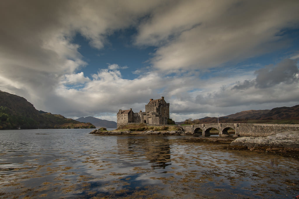 Outside view of Eilean Donan Castle from a distance near the Isle of Skye