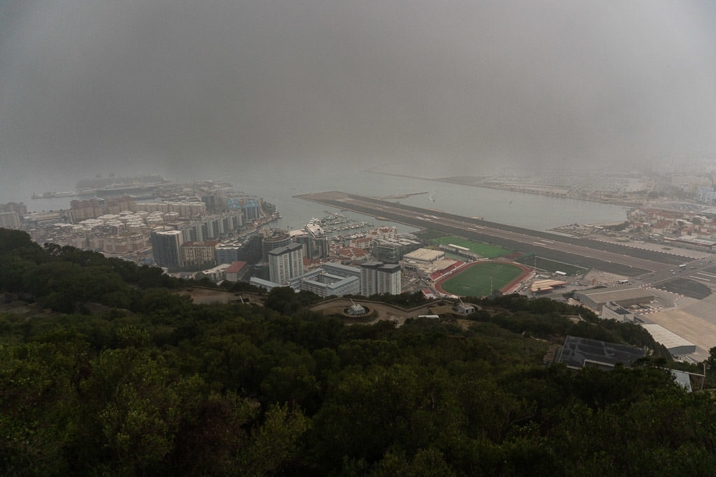 landing strip on foggy day of gibraltar