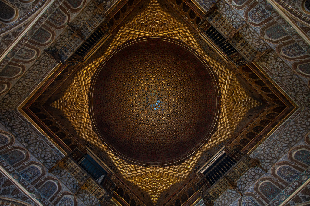 ornate gold ceiling in the real alcazar in sevilla spain