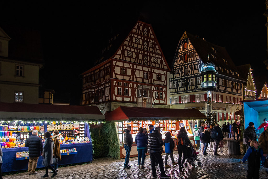 booths and medieval style buildings at rothenburg christmas markets in germany