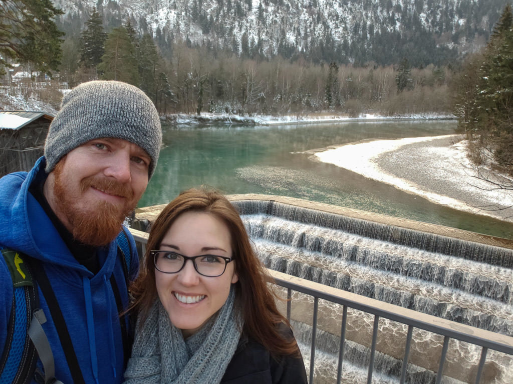couple photo at fussen waterfall in winter