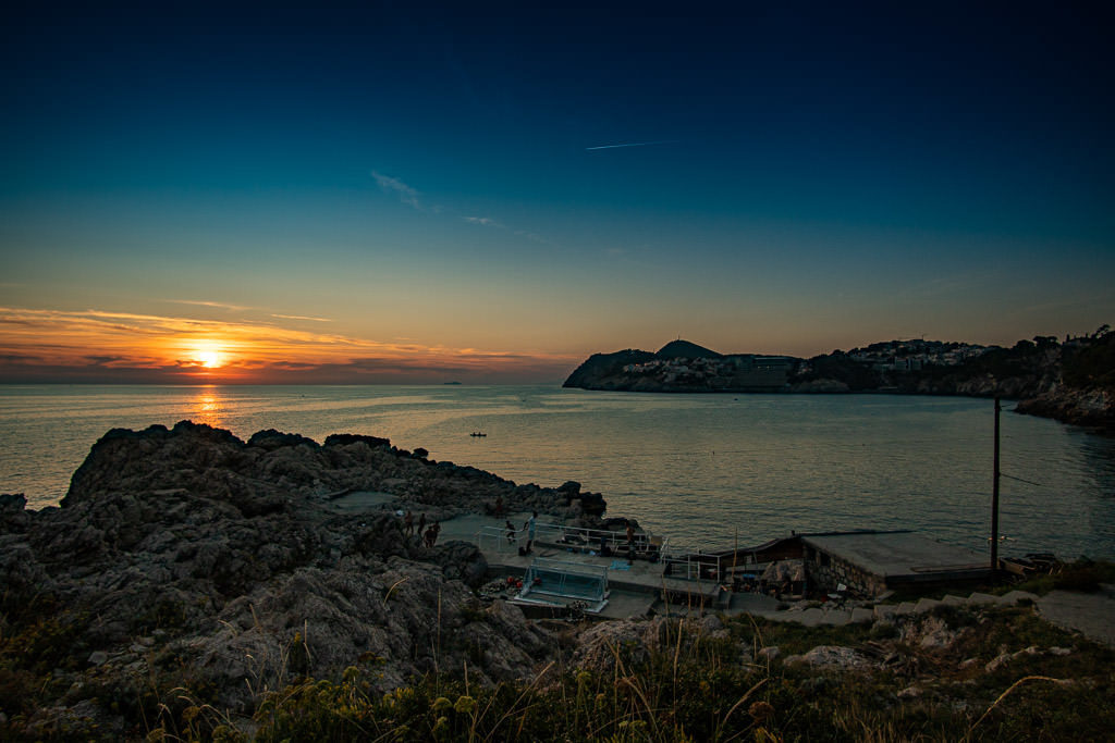 Sunset over Danče Beach with some locals playing a little footie