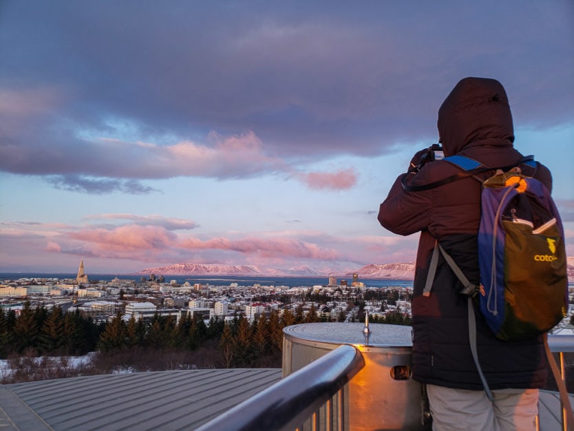 Buddy taking photos of Reykjavik on top of the Perlan 360 Observation Deck
