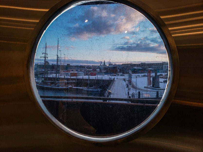 reykjavik maritime museum views through a porthole looking out onto the harbour