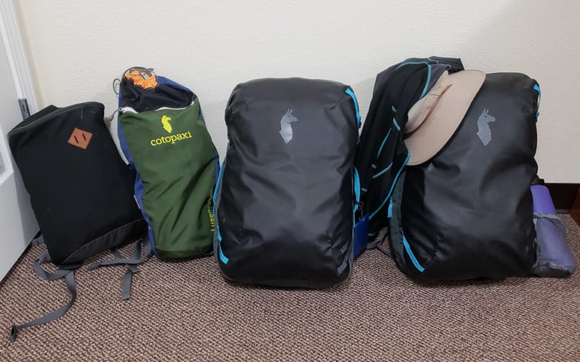 cotopaxi allpa travel packs and other carrry on bags packed for trip
