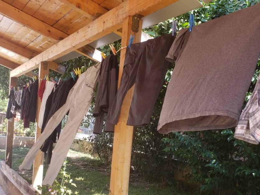hang drying laundry in greece