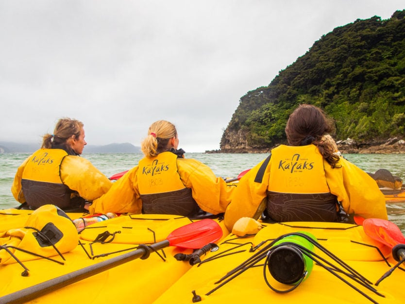 getting a kayaking lesson in Awaroa Bay with Abel Tasman Kayaks