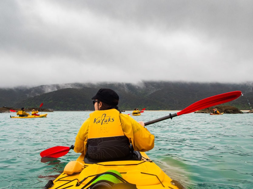 abel tasman kayak trip on a gloomy day