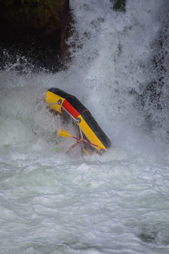 flipping over tutea falls on new zealand rafting trip with kaituna cascades