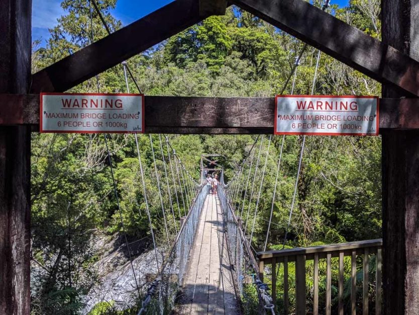 Warning Sign stating a limit of 6 people or 1,000kg on Bridge over Hokitika Gorge on the Hokitika Gorge Walk