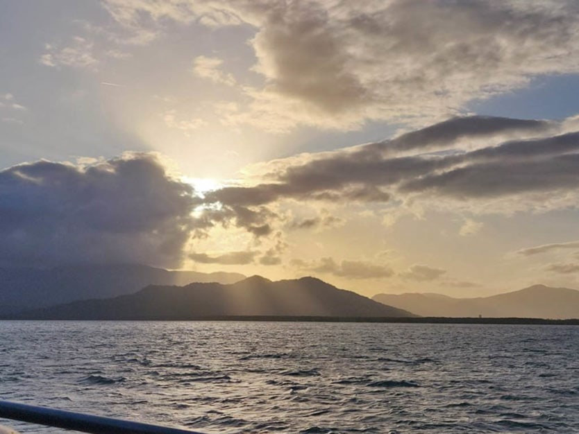 views from fitzroy island ferry at sunset