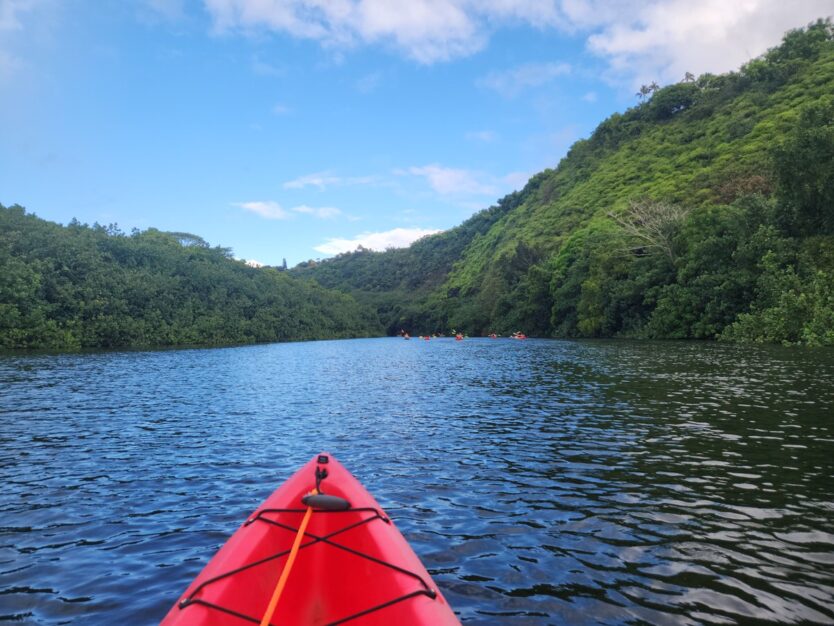 kayak on wailua river for secret falls hike